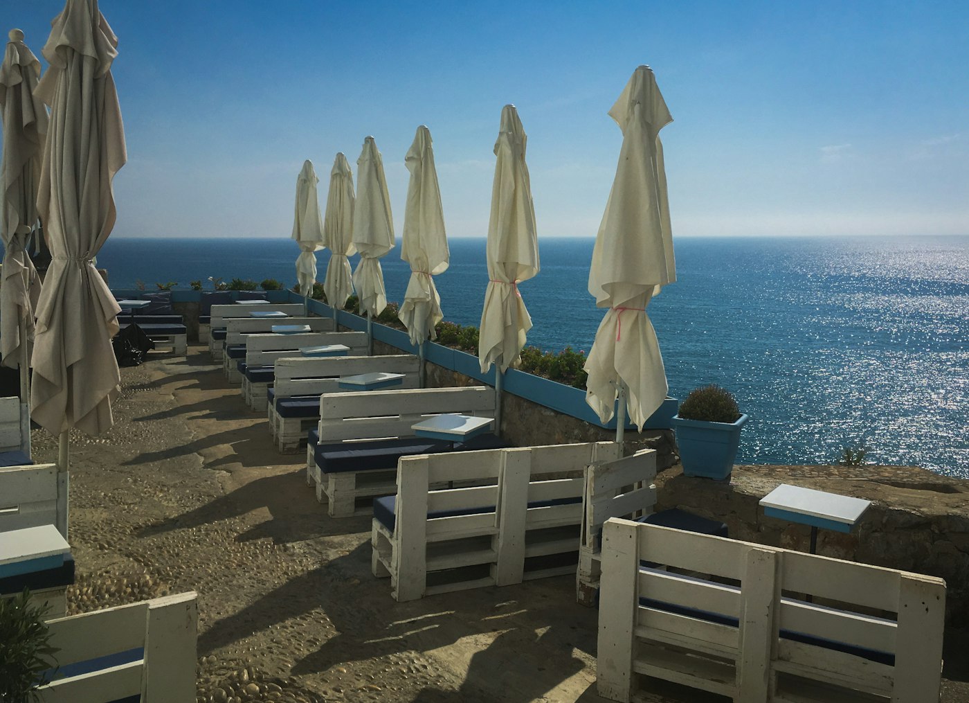 Outdoor terrace seating overlooking the water